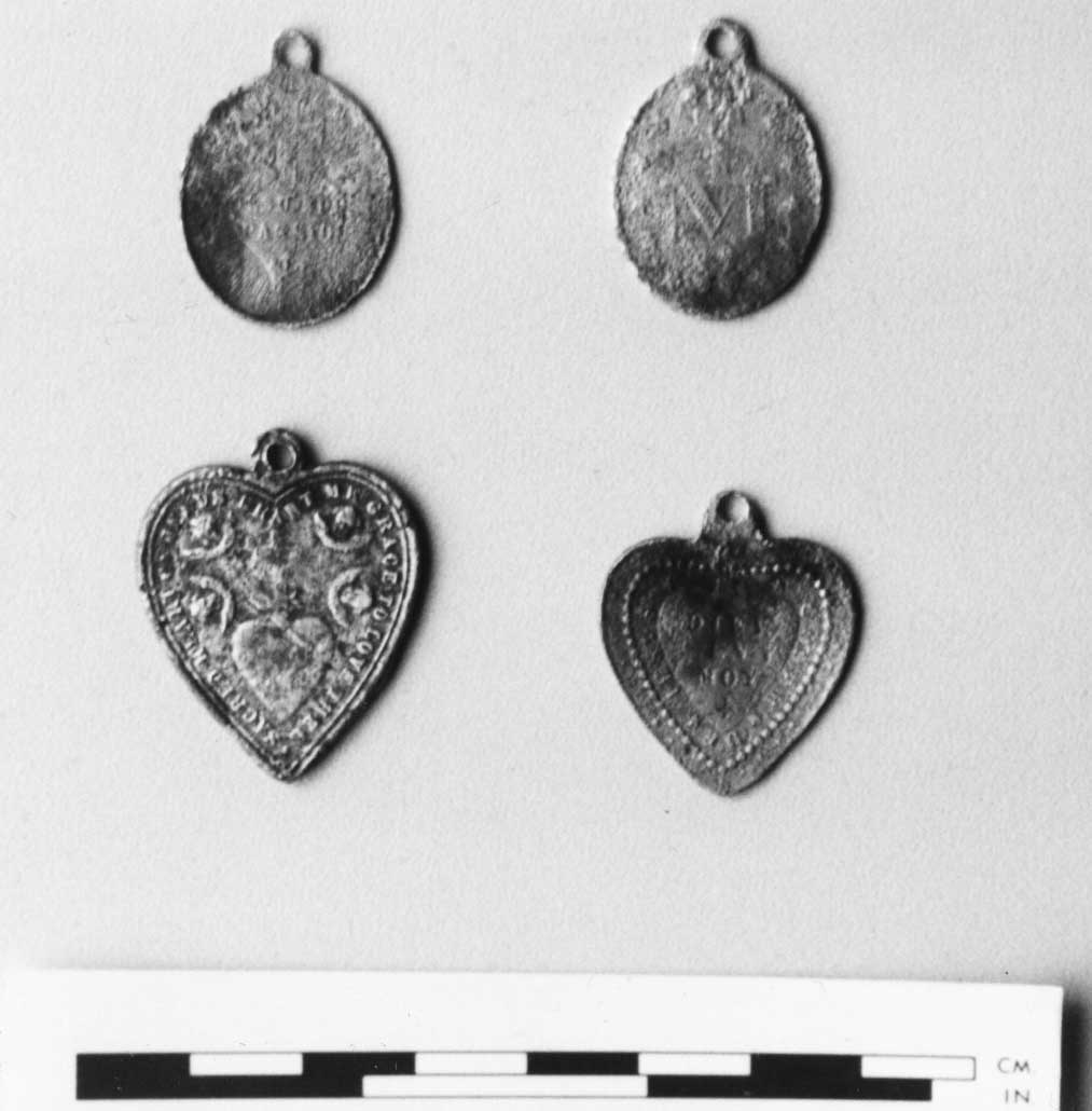 Medallions found with burials at manorhamilton